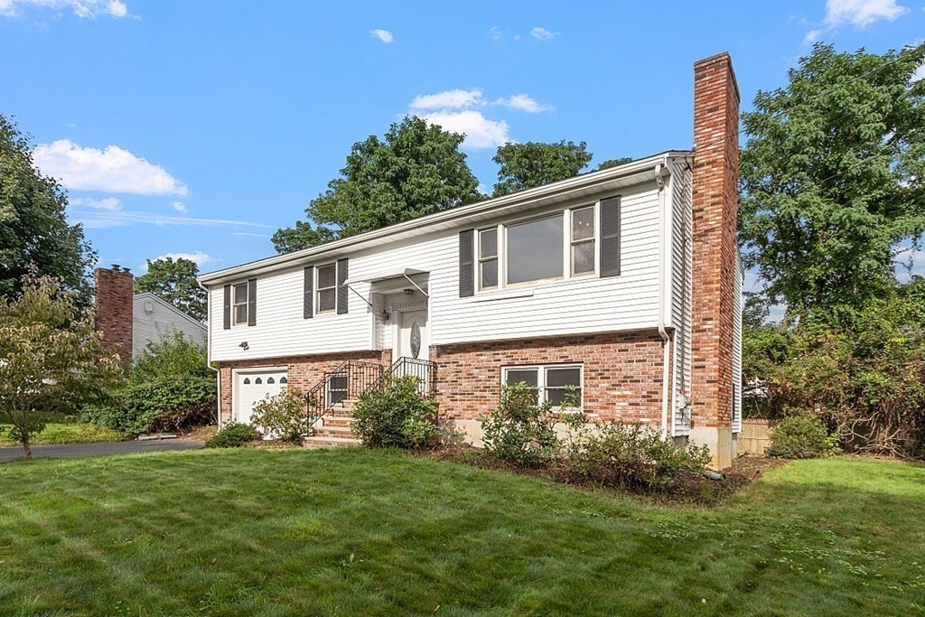 97 Riverview Boulevard Methuen, MA 01844 - Photo 23 of 30 a view of a house with backyard and garden