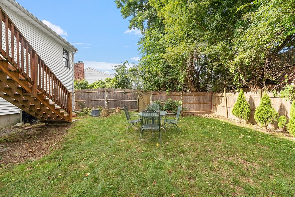 97 Riverview Boulevard Methuen, MA 01844 - Photo 25 of 30 a view of chair and table in the yard