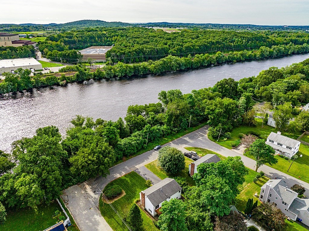 97 Riverview Boulevard Methuen, MA 01844 - Photo 30 of 30 an aerial view of a house with a yard and lake view