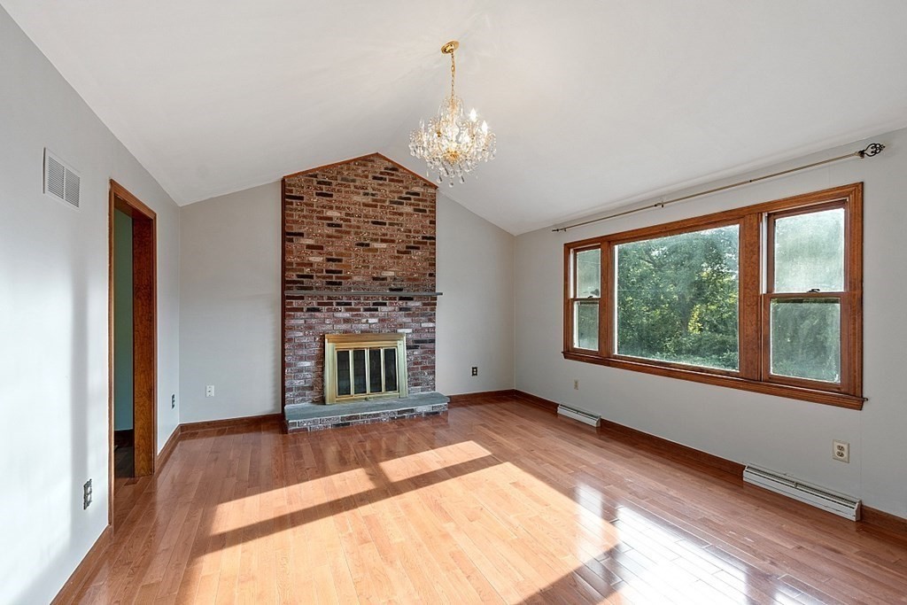 97 Riverview Boulevard Methuen, MA 01844 - Photo 3 of 30 a bedroom with bed and a large window