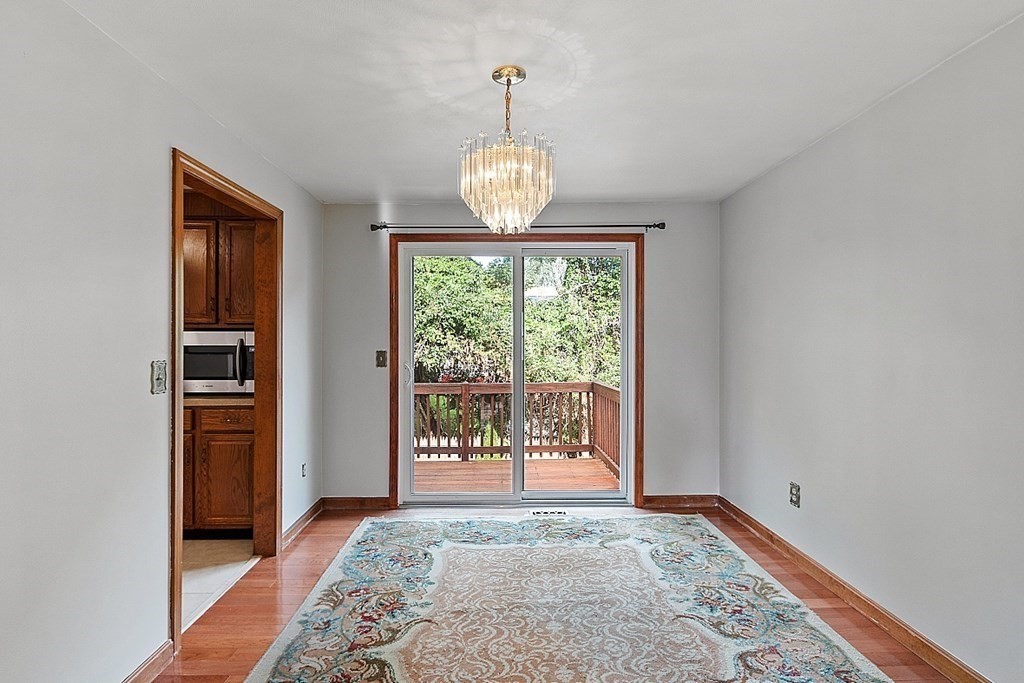 97 Riverview Boulevard Methuen, MA 01844 - Photo 5 of 30 a view of an empty room with a window