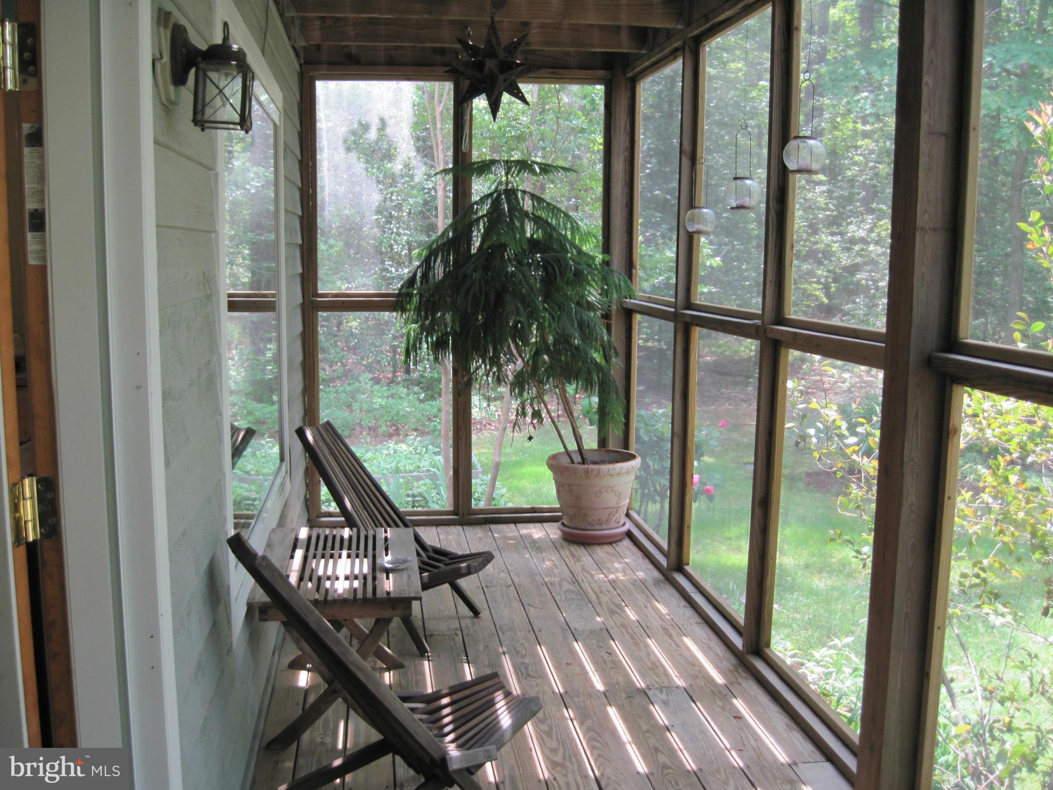 9041 New Road McDaniel, MD 21647 - Photo 20 of 30 Screened porch with French doors to interior