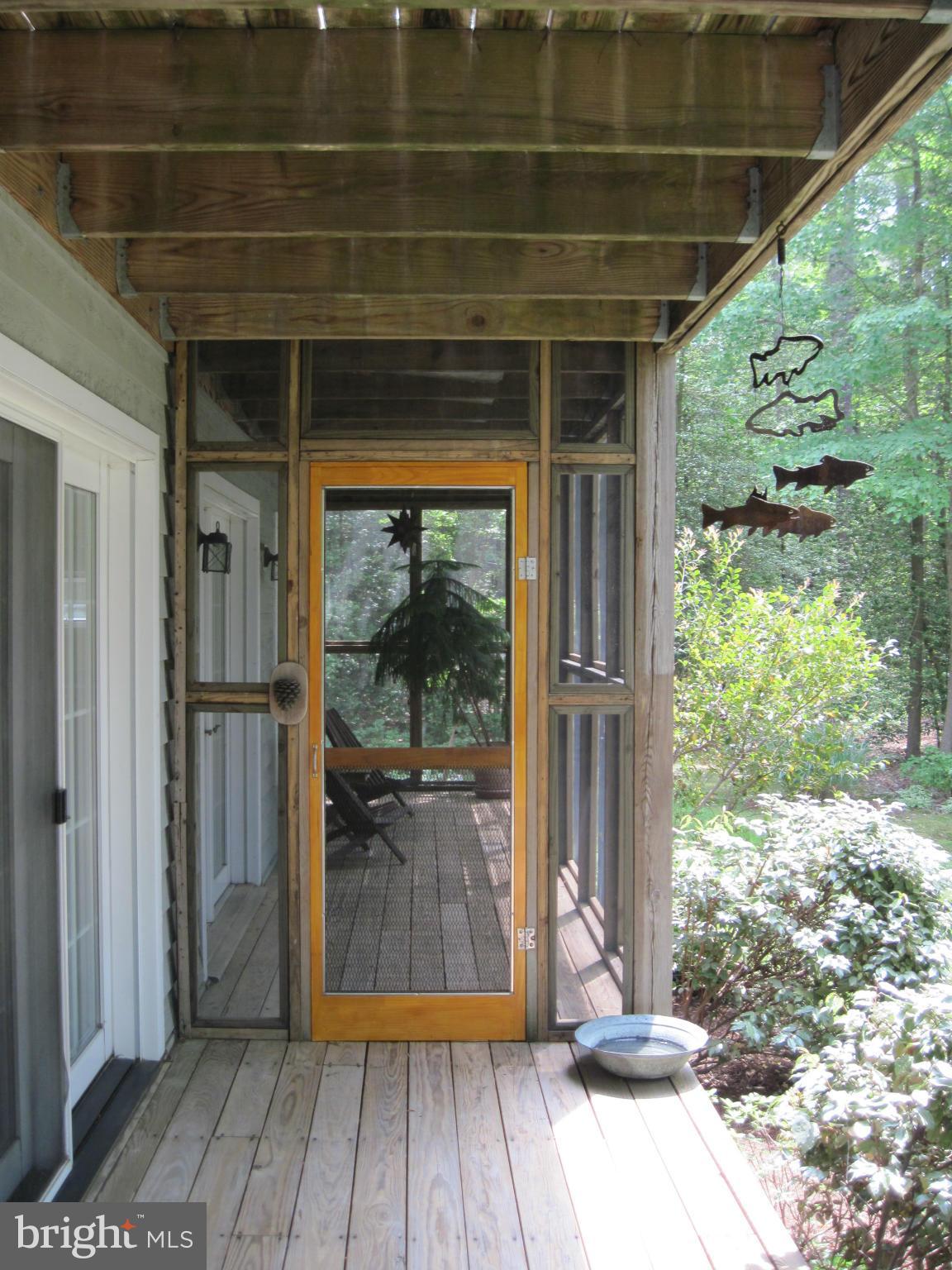 9041 New Road McDaniel, MD 21647 - Photo 22 of 30 Deck to screened porch entrance