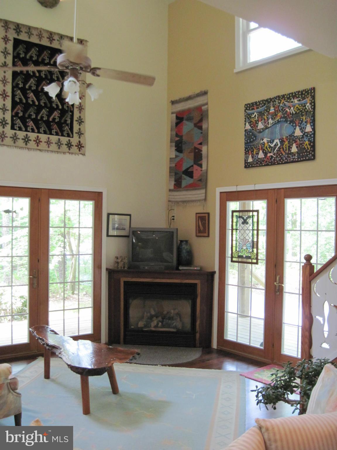 9041 New Road McDaniel, MD 21647 - Photo 5 of 30 2 story living room ceiling