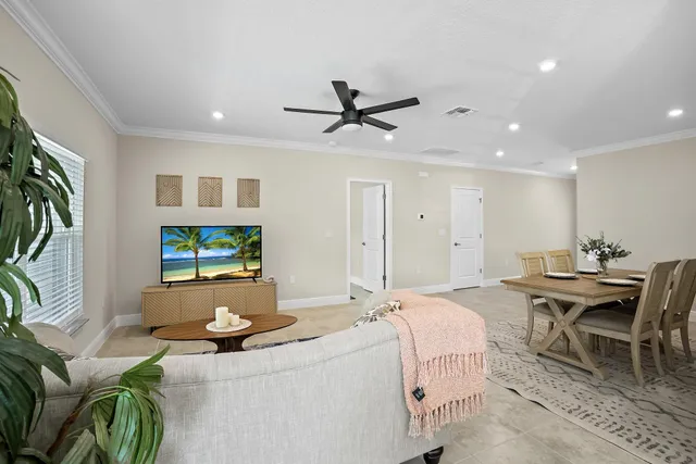 a kitchen with stainless steel appliances granite countertop a refrigerator sink stove microwave and cabinets