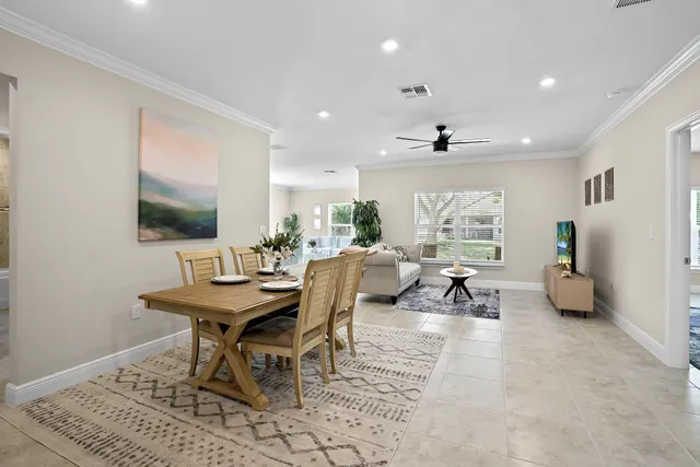 a view of a dining room with furniture