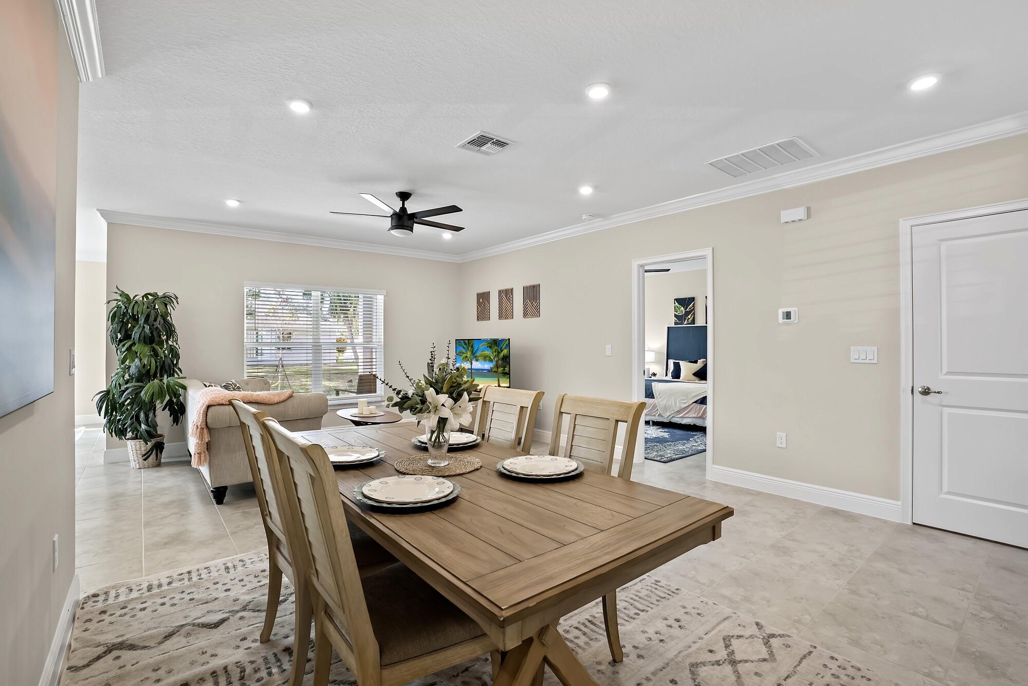 418 Easy Street Sebastian, FL 32958 - Photo 19 of 42 a view of a dining room with furniture