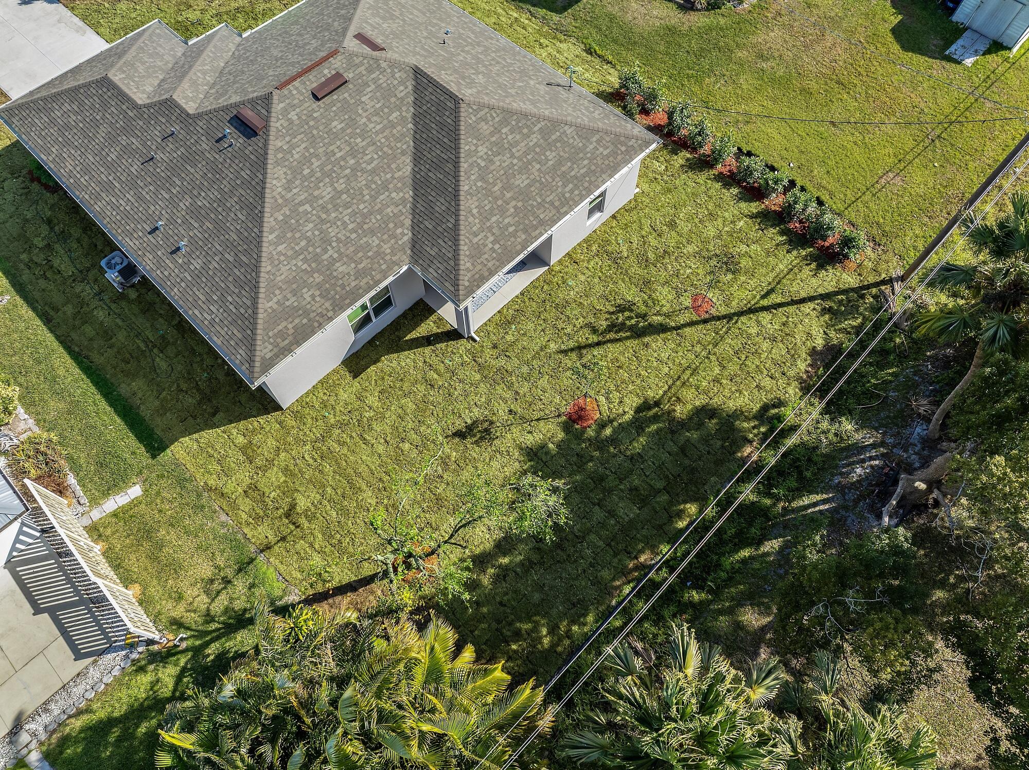 418 Easy Street Sebastian, FL 32958 - Photo 2 of 42 a view of a backyard