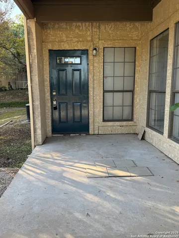 a view of entrance gate of a house
