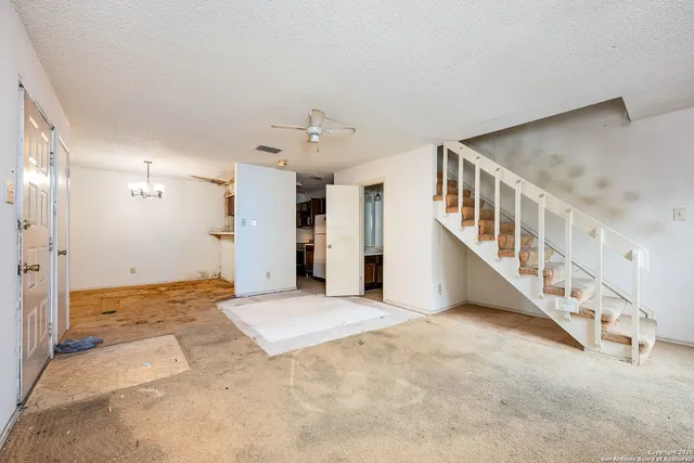 a view of an entryway with staircase