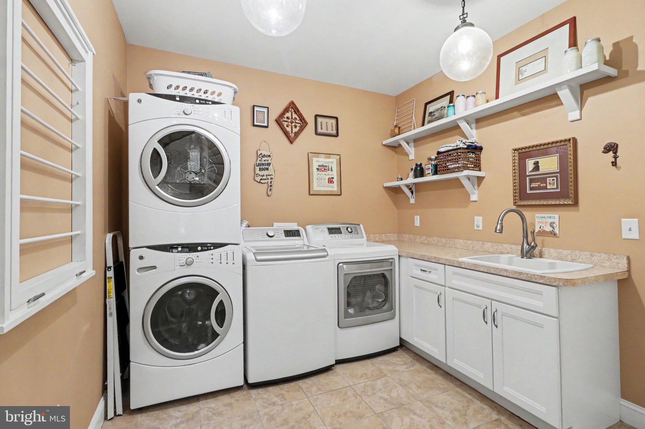 1080 Swatara Road Hershey, PA 17033 - Photo 40 of 59 a utility room with sink dryer and washer
