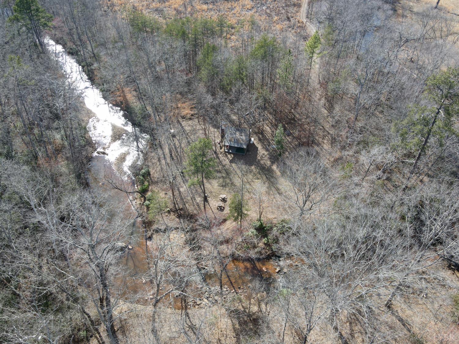 0 East Ferry Road Gladys, VA 24554 - Photo 31 of 45 a view of a dry yard with green space and fog