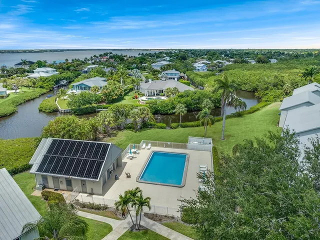 a view of a yard with furniture