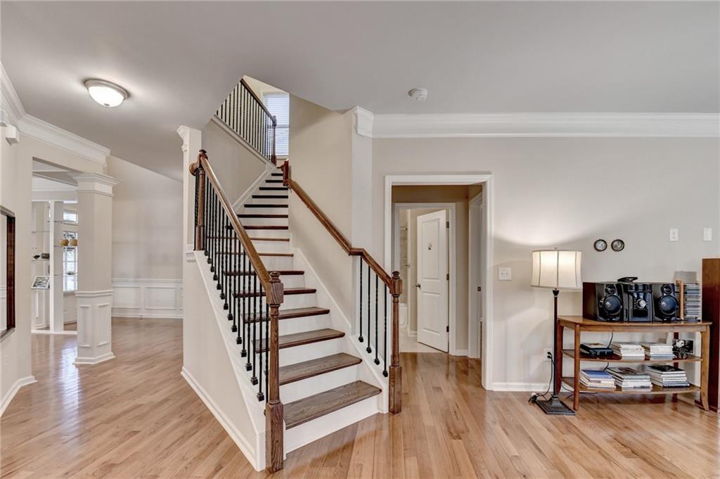 2455 Matlin Way Buford, GA 30519 - Photo 26 of 58 a view of a kitchen with wooden floor and cabinets