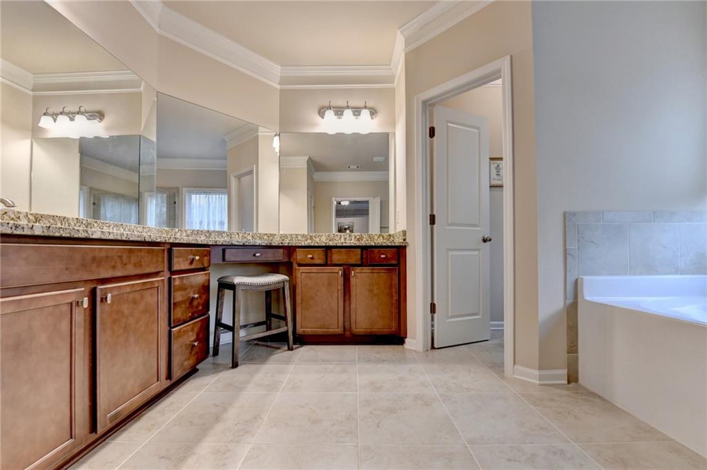 2455 Matlin Way Buford, GA 30519 - Photo 36 of 58 a view of a kitchen with a sink