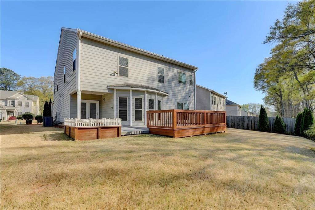 2455 Matlin Way Buford, GA 30519 - Photo 52 of 58 a view of a house with a patio