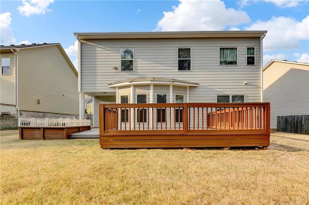 2455 Matlin Way Buford, GA 30519 - Photo 53 of 58 a view of a house with wooden fence