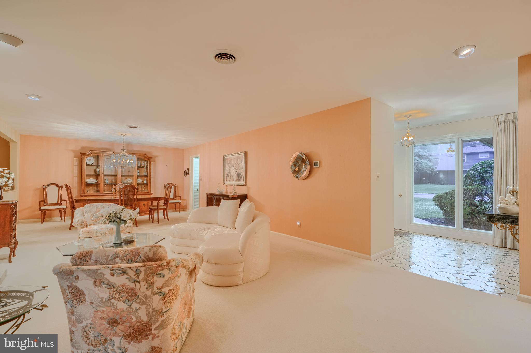 7900 Ivy Lane Baltimore, MD 21208 - Photo 14 of 32 a living room with furniture and a table