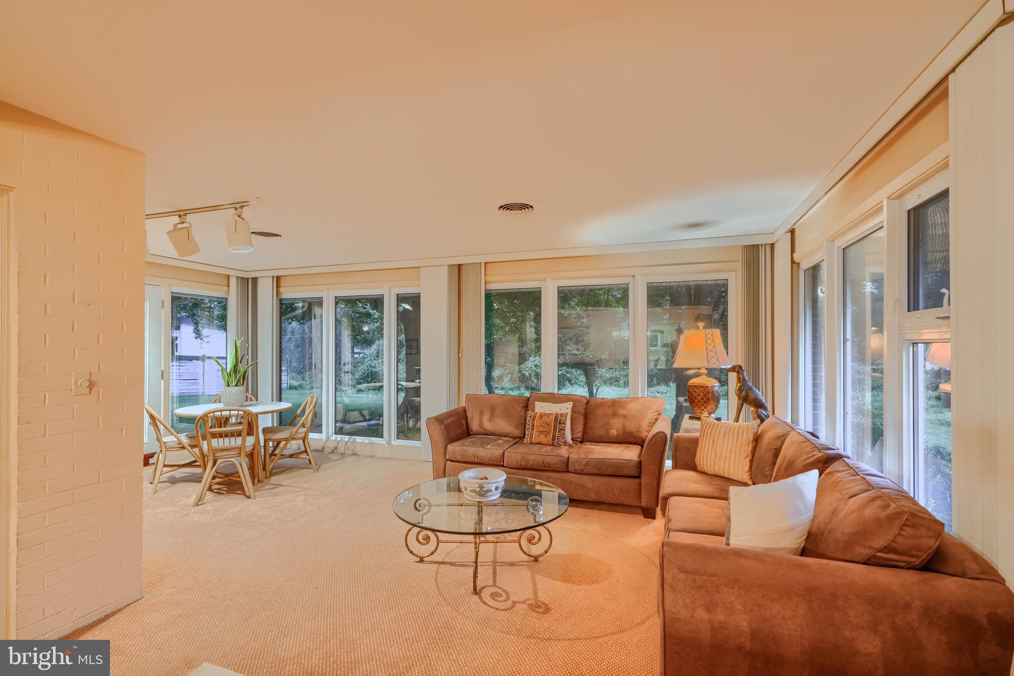 7900 Ivy Lane Baltimore, MD 21208 - Photo 15 of 32 a living room with furniture and a large window