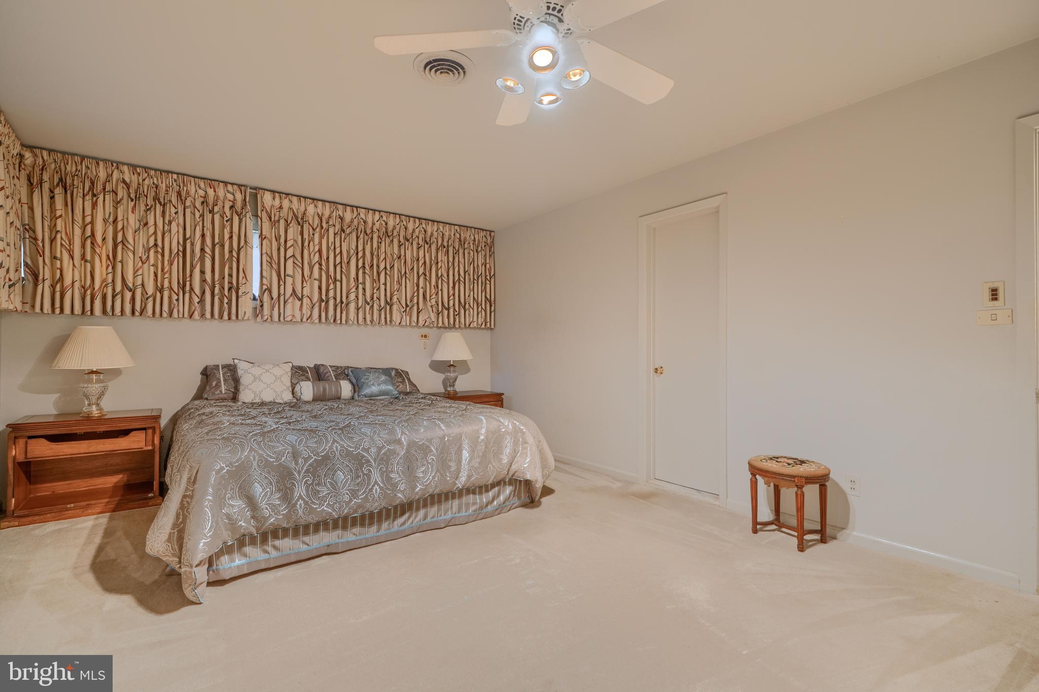 7900 Ivy Lane Baltimore, MD 21208 - Photo 18 of 32 a bedroom with a bed and with furniture