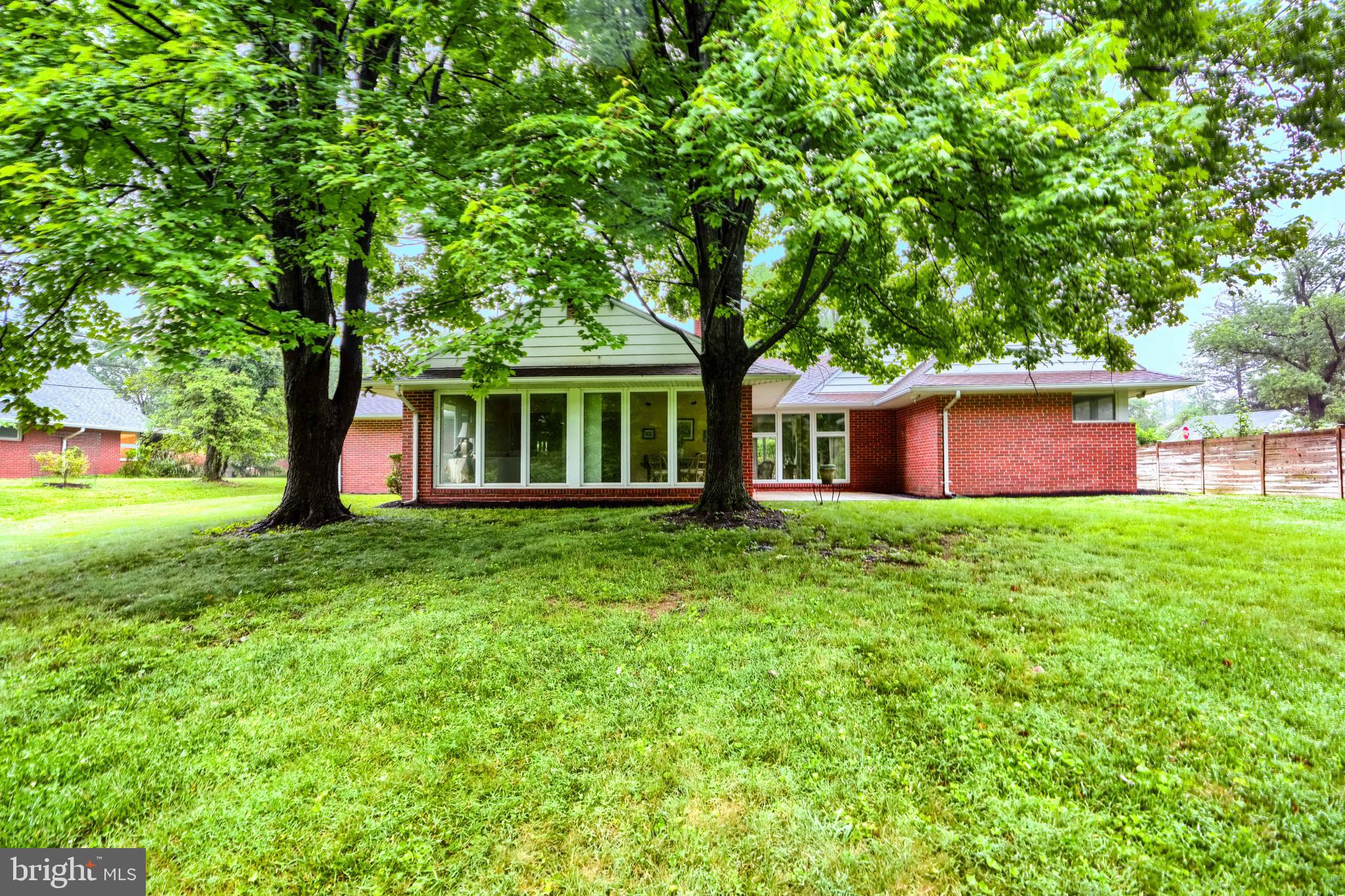 7900 Ivy Lane Baltimore, MD 21208 - Photo 3 of 32 a front view of a house with garden