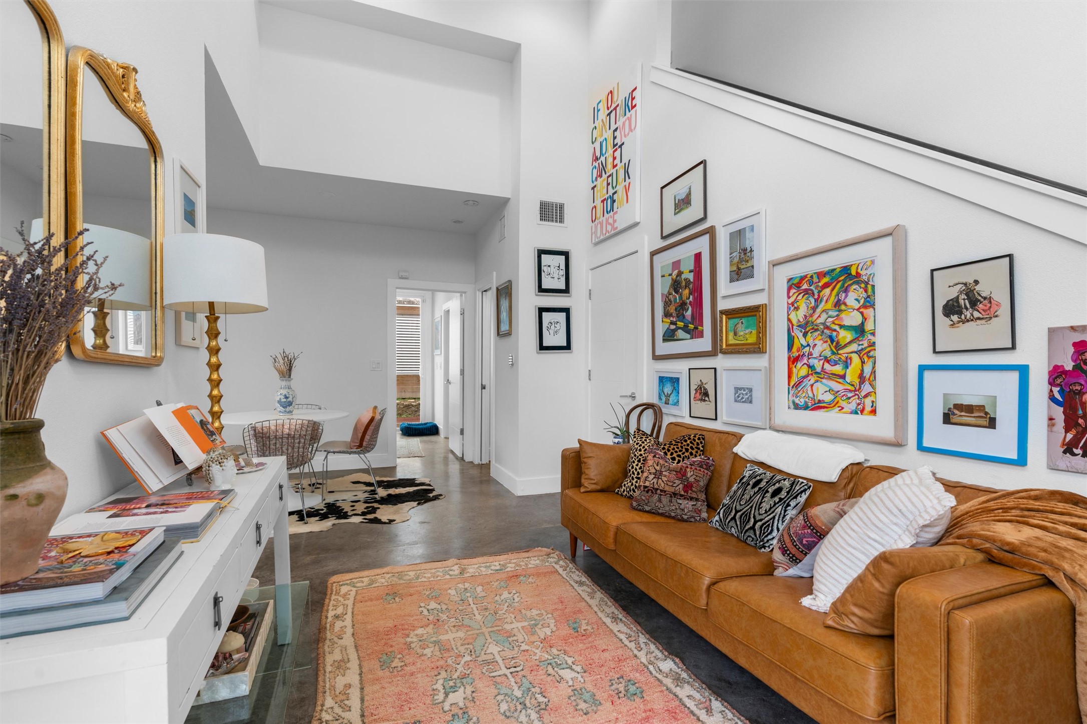 a living room with furniture and a couch