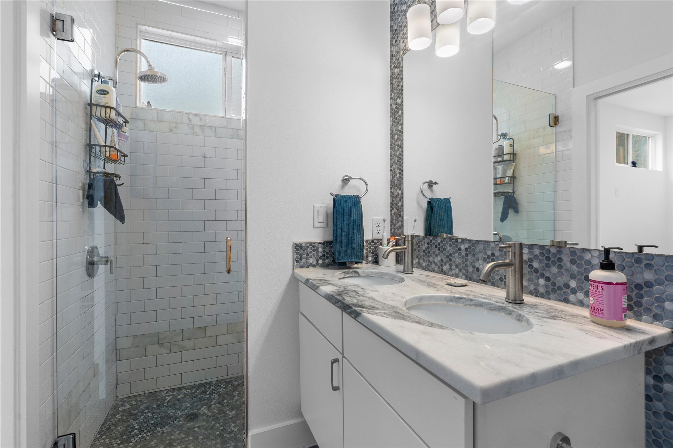 2514 East 4th Street, Unit B Austin, TX 78702 - Photo 13 of 22 a bathroom with a granite countertop sink and a mirror