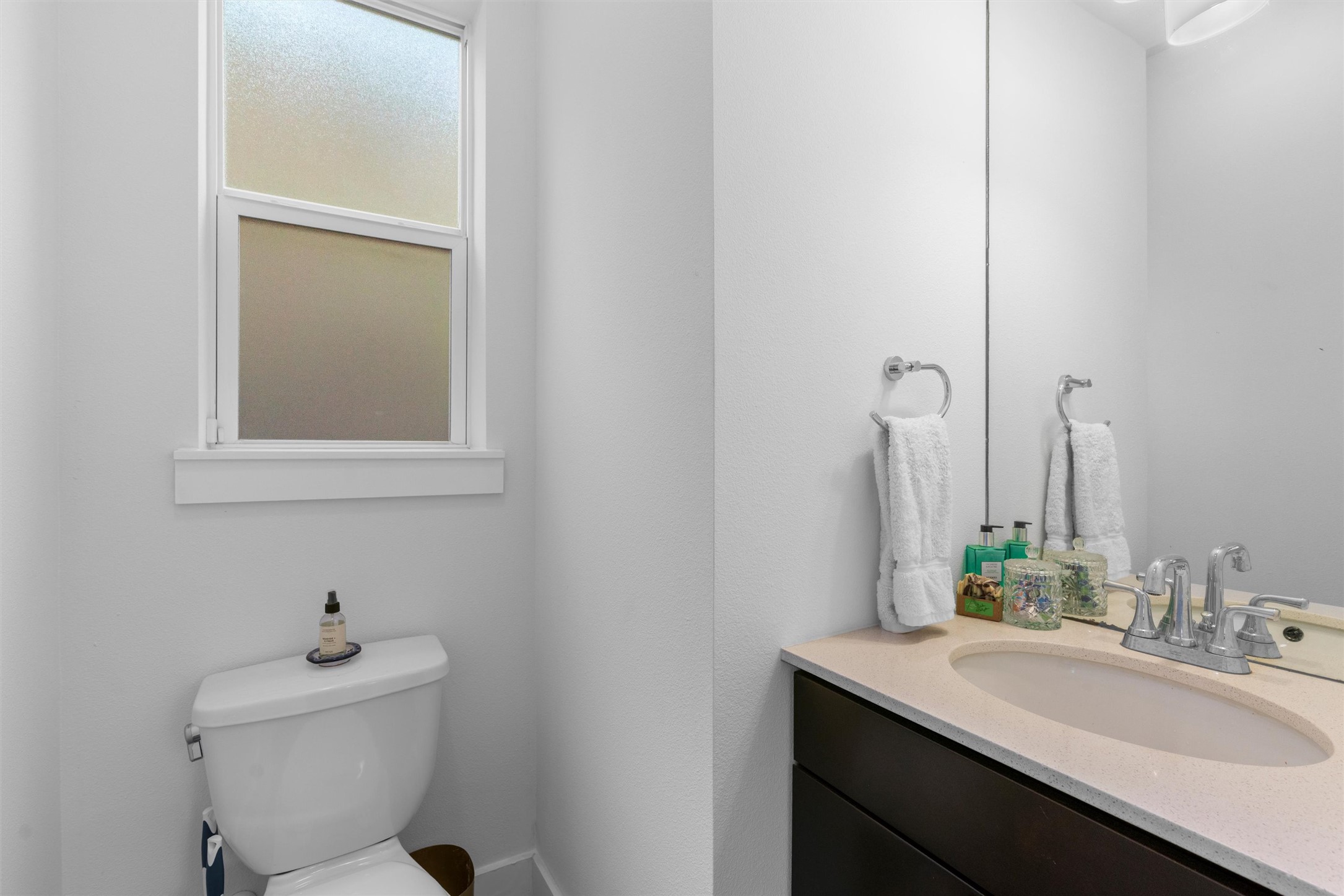2514 East 4th Street, Unit B Austin, TX 78702 - Photo 16 of 22 a bathroom with a sink and a toilet