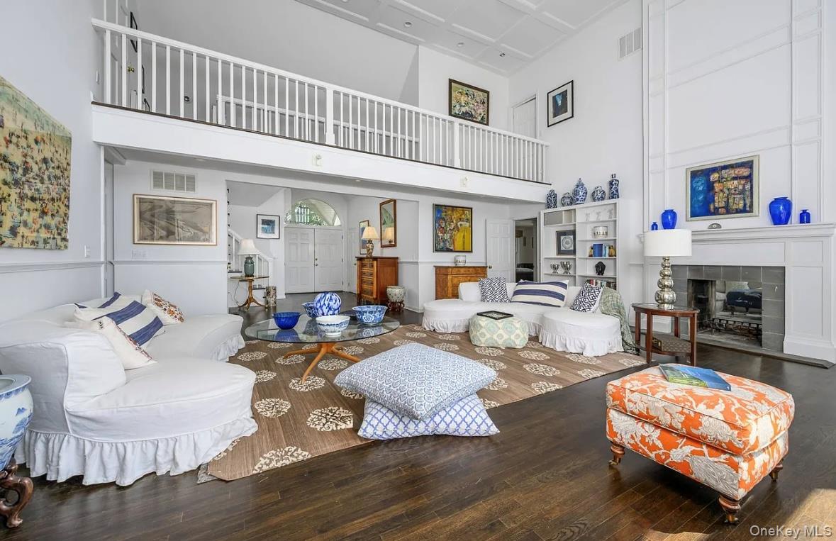 972 Noyac Path Water Mill, NY 11976 - Photo 13 of 40 a living room with furniture and a fireplace