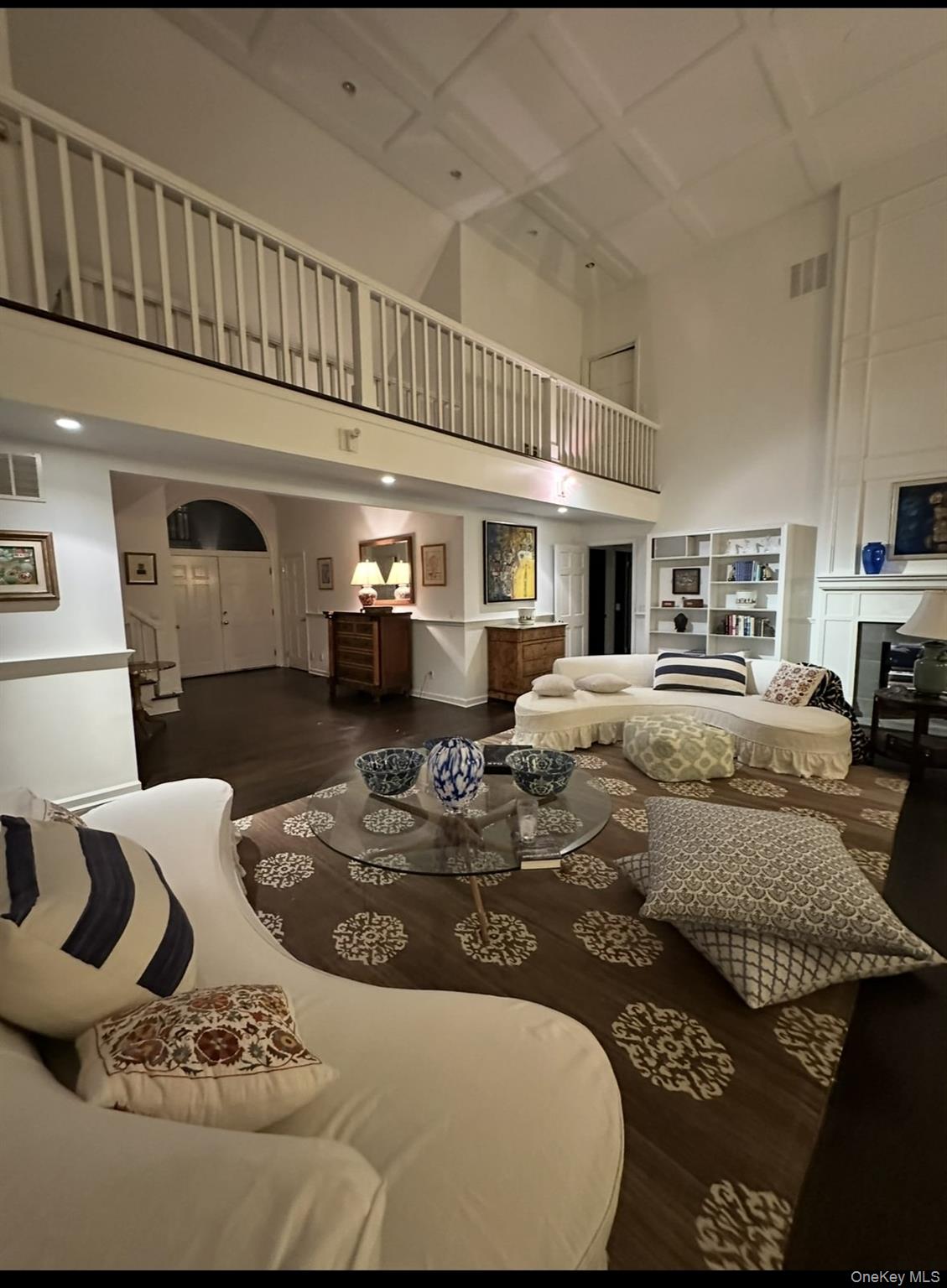 972 Noyac Path Water Mill, NY 11976 - Photo 14 of 40 a living room with furniture a fireplace and a table