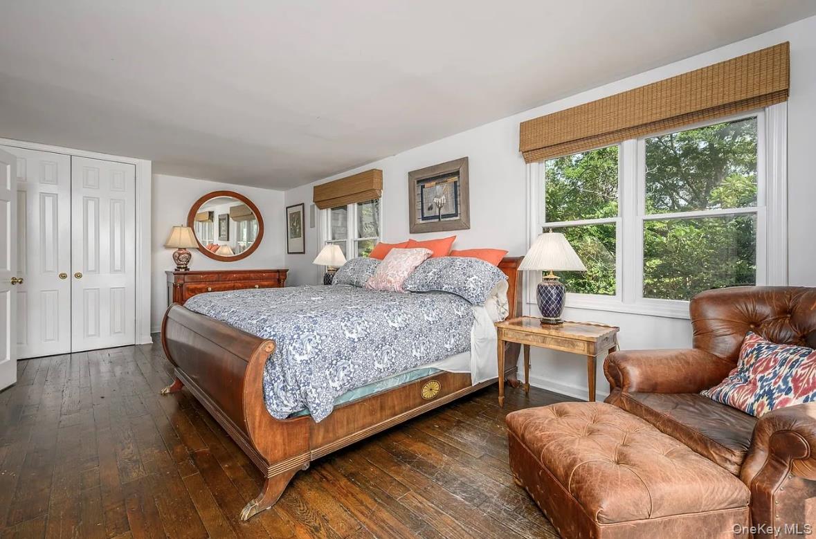 972 Noyac Path Water Mill, NY 11976 - Photo 19 of 40 a bedroom with a bed and a couch