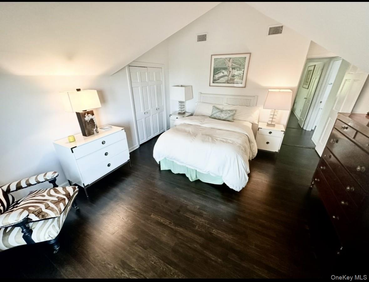 972 Noyac Path Water Mill, NY 11976 - Photo 22 of 40 a bed room with a bed and a night stand