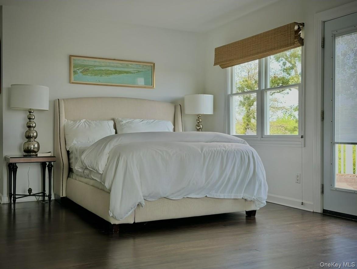 972 Noyac Path Water Mill, NY 11976 - Photo 23 of 40 a bedroom with a bed and window