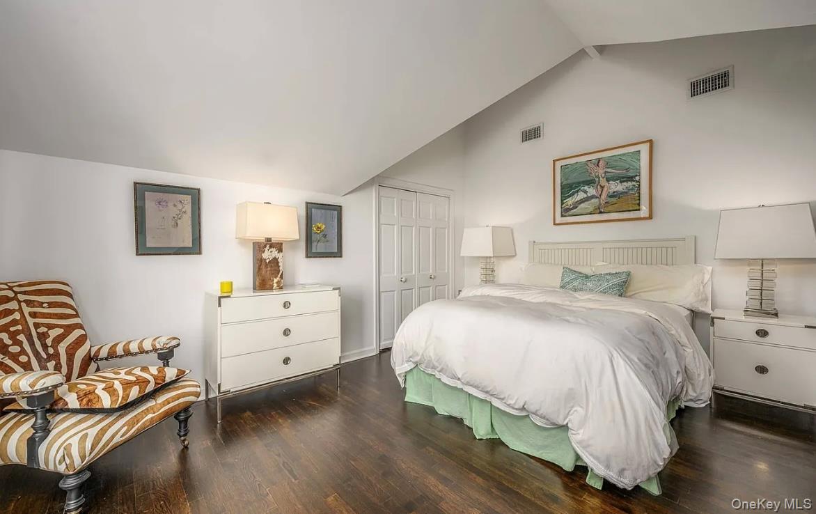 972 Noyac Path Water Mill, NY 11976 - Photo 26 of 40 a bedroom with a bed and a couch