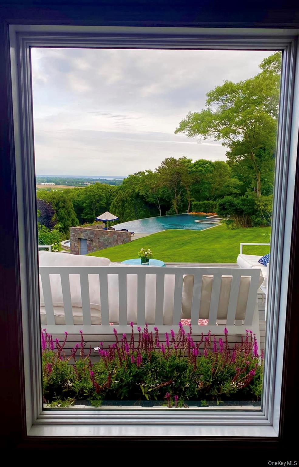 972 Noyac Path Water Mill, NY 11976 - Photo 36 of 40 a view of swimming pool from a window