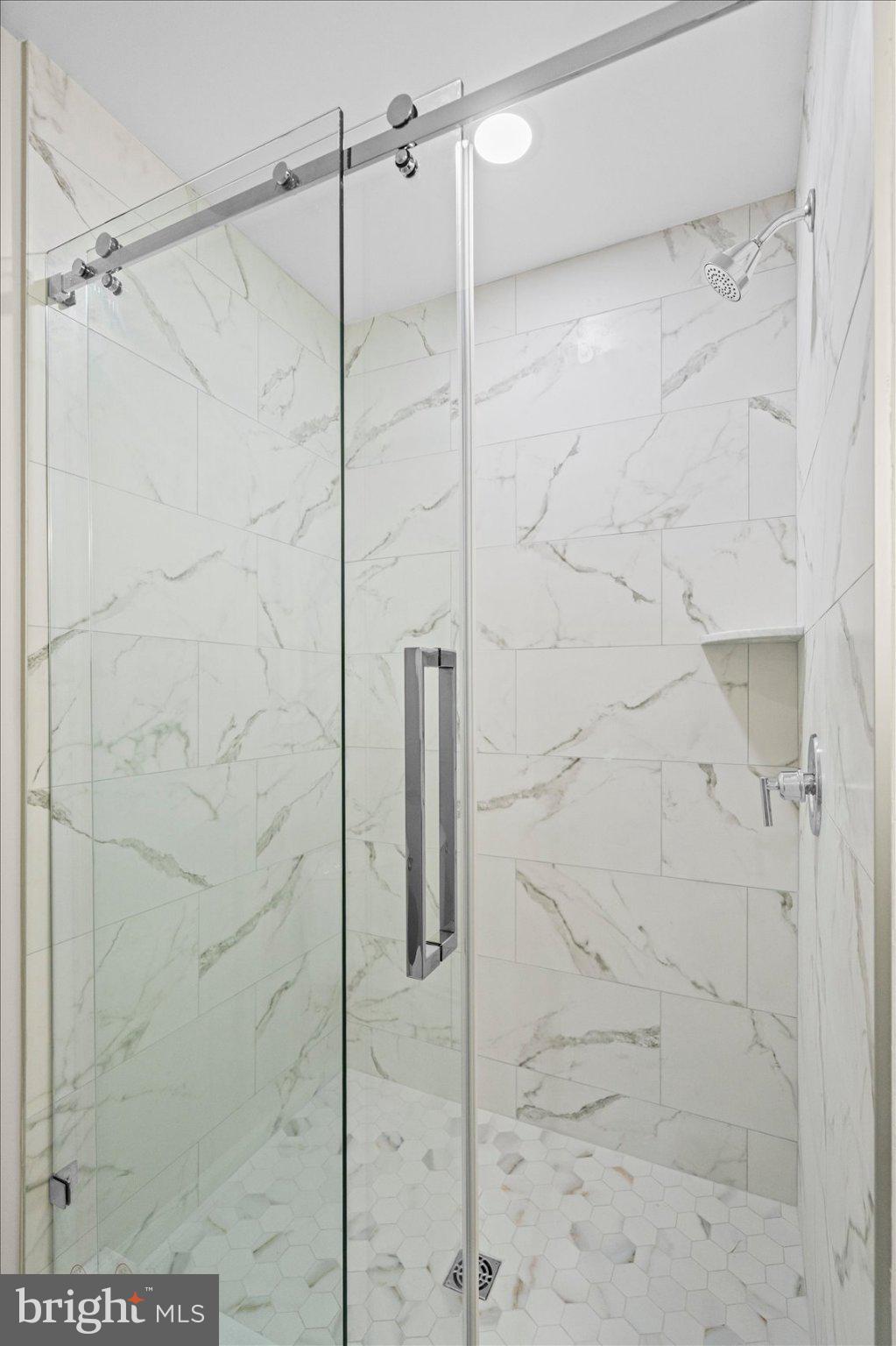 2056 Brown Road Finksburg, MD 21048 - Photo 26 of 45 Sleek glass shower with elegant tiles.