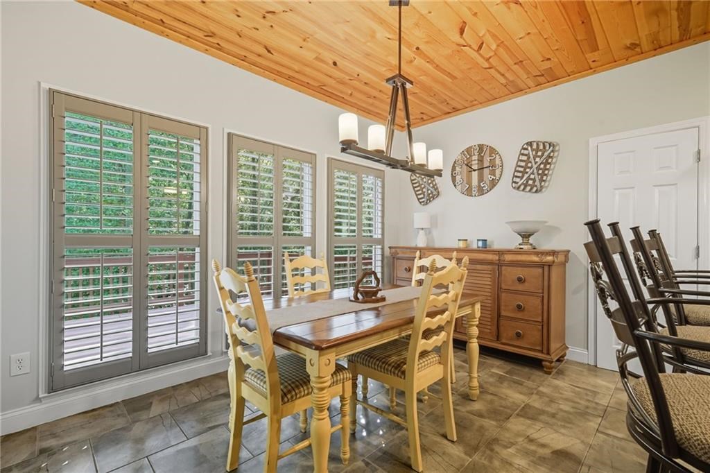491 Hyde Road Jasper, GA 30143 - Photo 11 of 60 a dining room with furniture and window