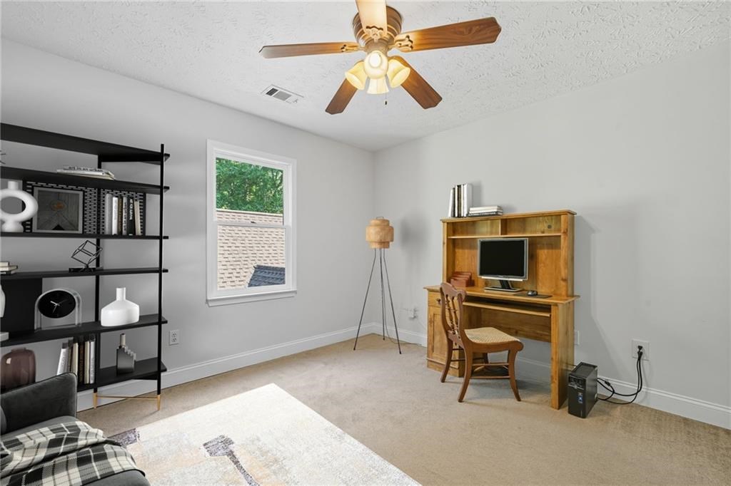 491 Hyde Road Jasper, GA 30143 - Photo 28 of 60 a bedroom with furniture and a window