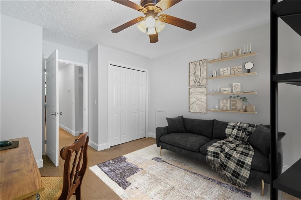 491 Hyde Road Jasper, GA 30143 - Photo 29 of 60 a living room with furniture rug and window