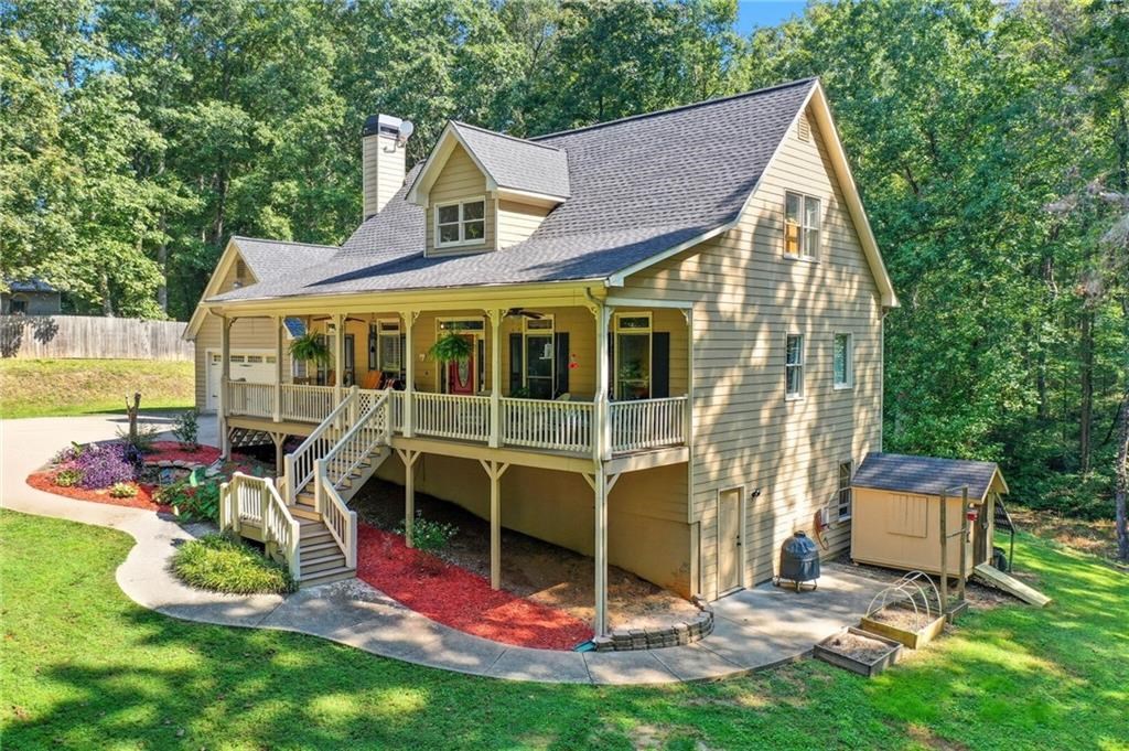 491 Hyde Road Jasper, GA 30143 - Photo 44 of 60 a view of a house with a backyard
