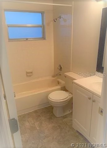 514 South Old County Road Edgewater, FL 32132 - Photo 8 of 10 a bathroom with a toilet a sink and bathtub