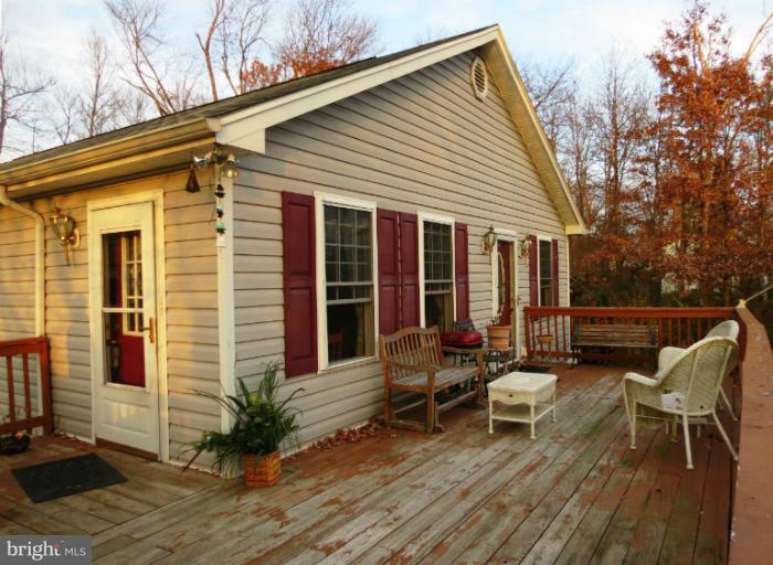 4814 Valley Forge Road Randallstown, MD 21133 - Photo 11 of 16 a view of a house with backyard and sitting area