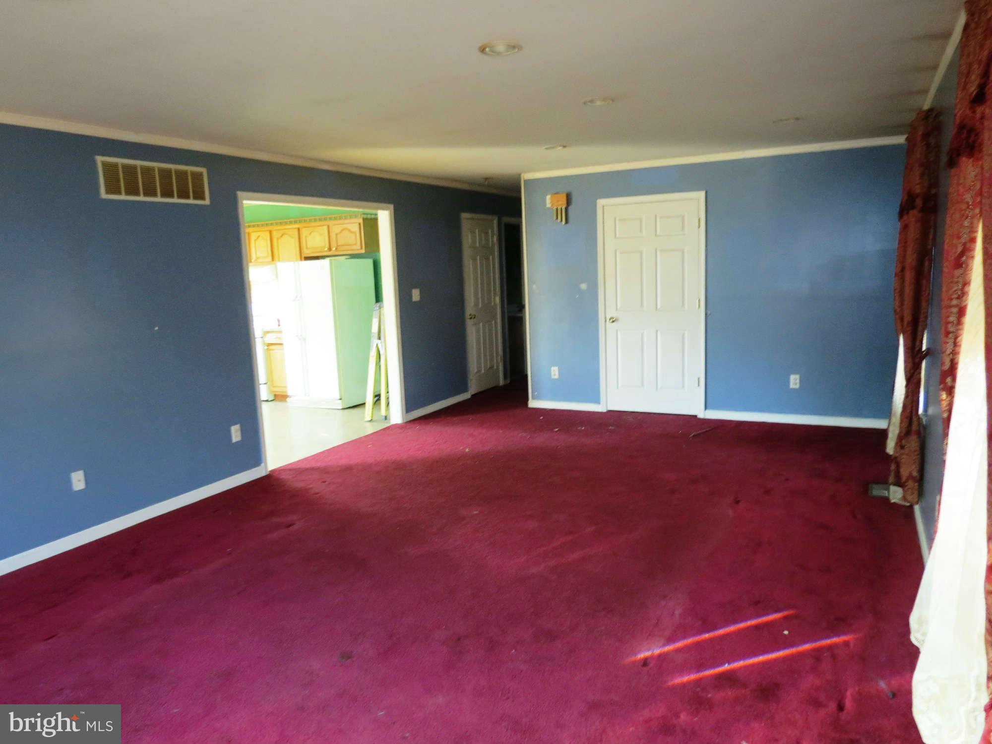 4814 Valley Forge Road Randallstown, MD 21133 - Photo 3 of 16 a view of an empty room with a window