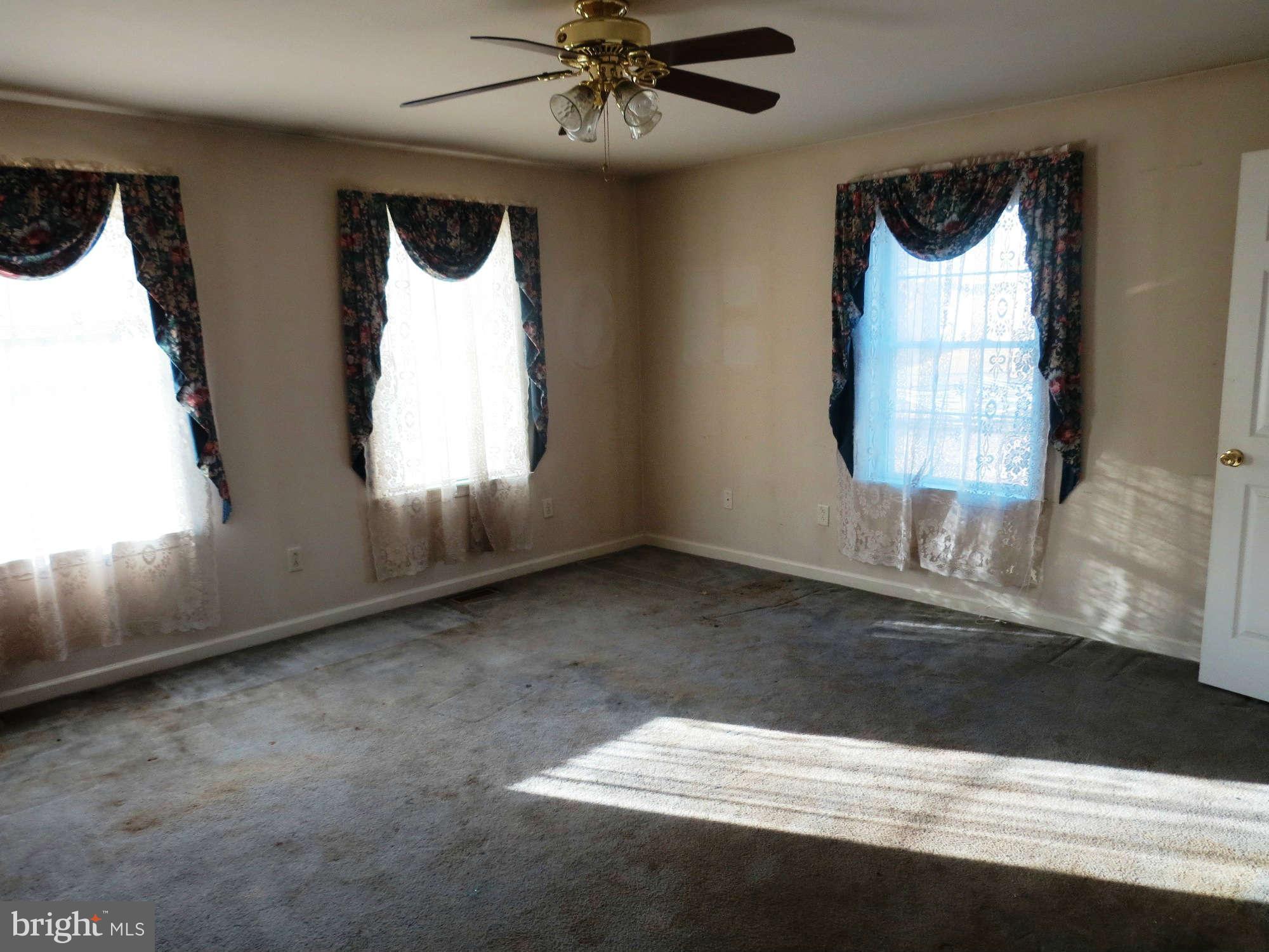 4814 Valley Forge Road Randallstown, MD 21133 - Photo 6 of 16 a view of an empty room and window
