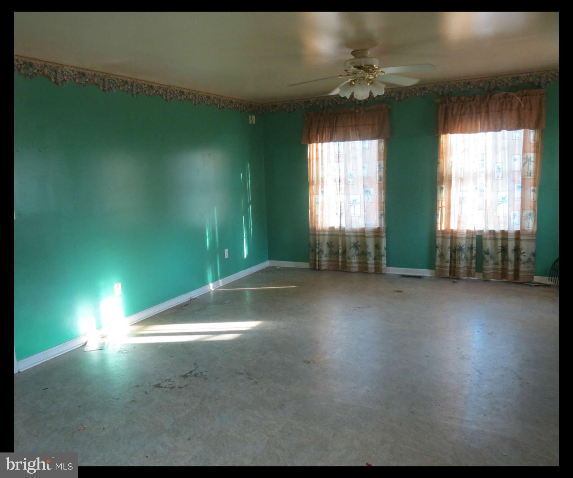 4814 Valley Forge Road Randallstown, MD 21133 - Photo 9 of 16 a view of empty room with window