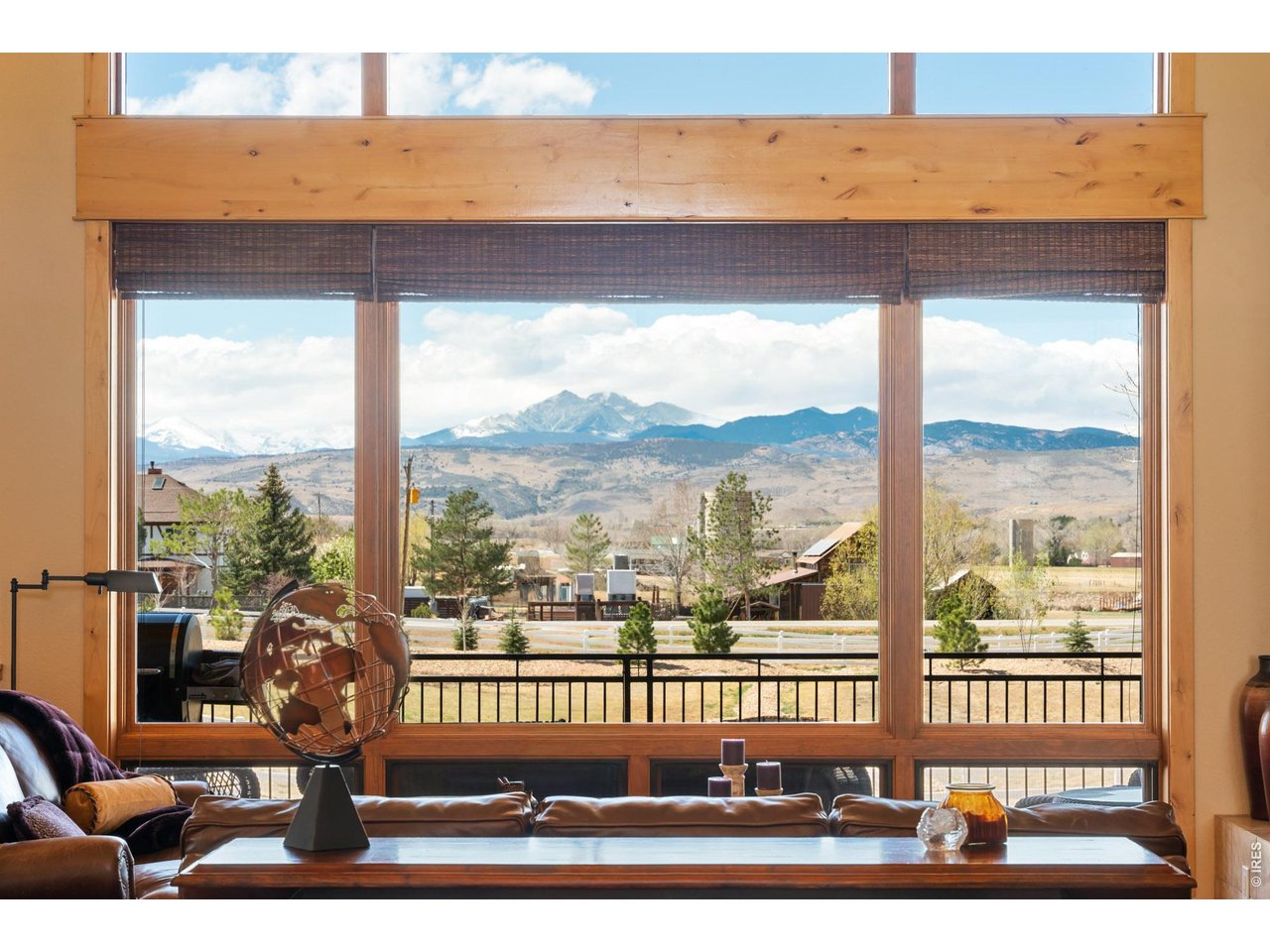 3032 Center Ridge Drive Berthoud, CO 80513 - Photo 1 of 44 Sweeping mountain vistas unfold the moment you step inside.