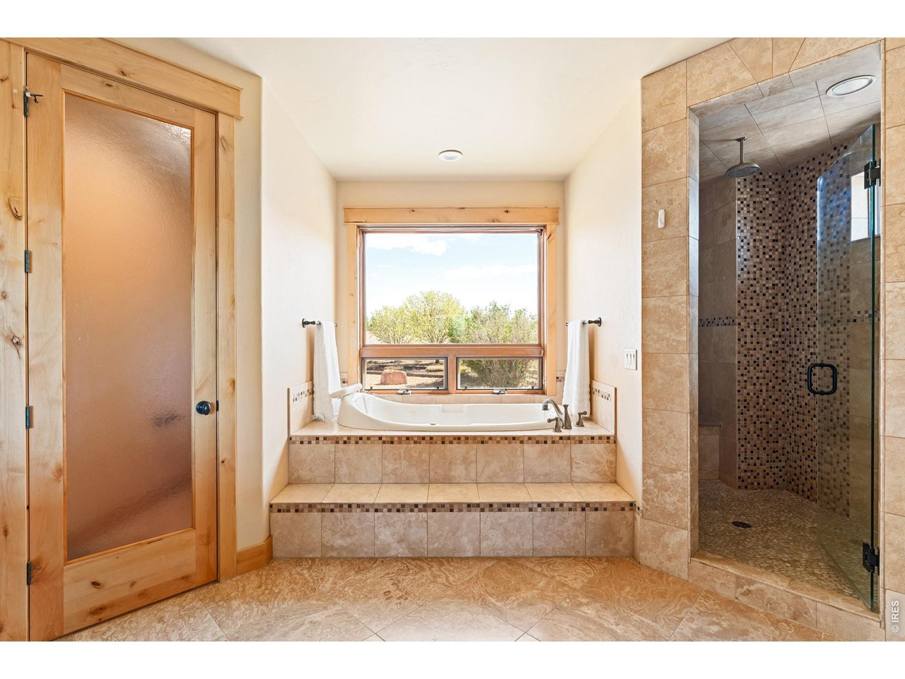 3032 Center Ridge Drive Berthoud, CO 80513 - Photo 19 of 44 Primary luxury bathroom.