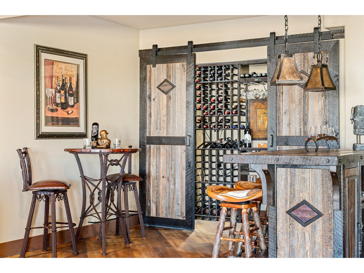 3032 Center Ridge Drive Berthoud, CO 80513 - Photo 29 of 44 The western-inspired nook, paired with a nearby wine closet, adds character and charm to the basement seating area.