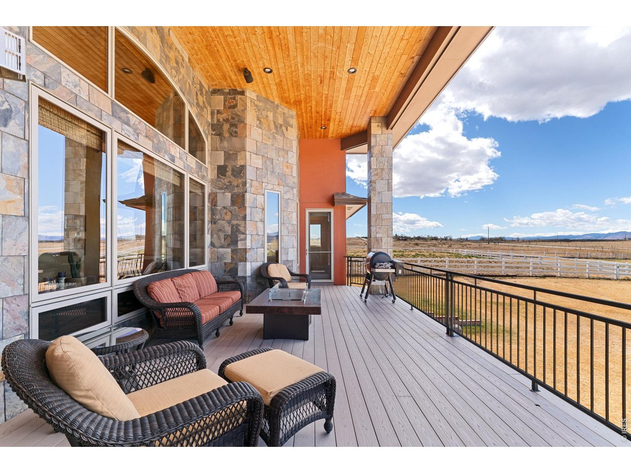 3032 Center Ridge Drive Berthoud, CO 80513 - Photo 34 of 44 The west-facing deck is the perfect place to take in Colorado's unforgettable sunsets.