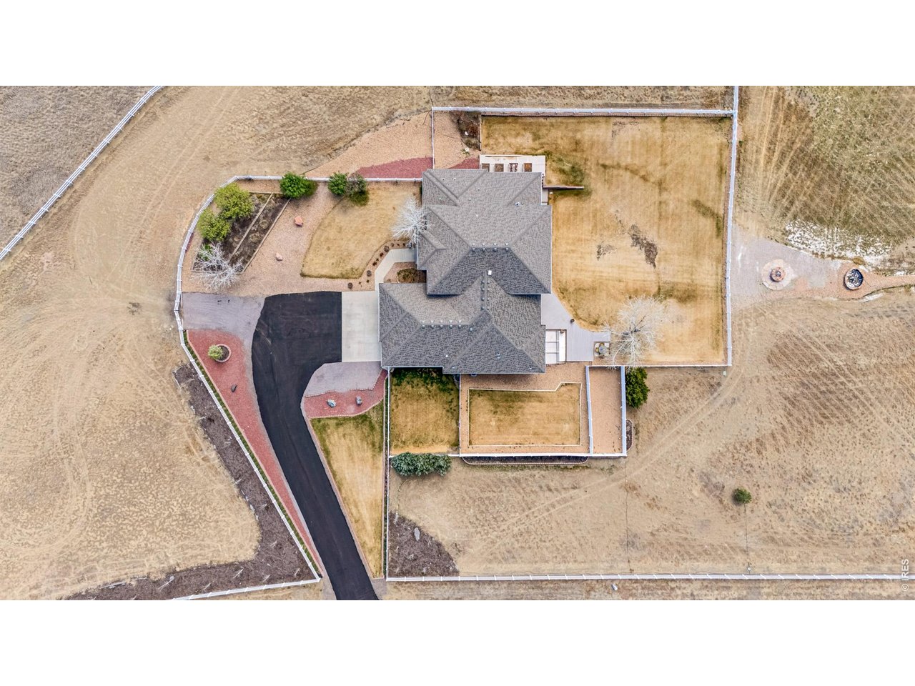 3032 Center Ridge Drive Berthoud, CO 80513 - Photo 36 of 44 Freshly laid blacktop driveway